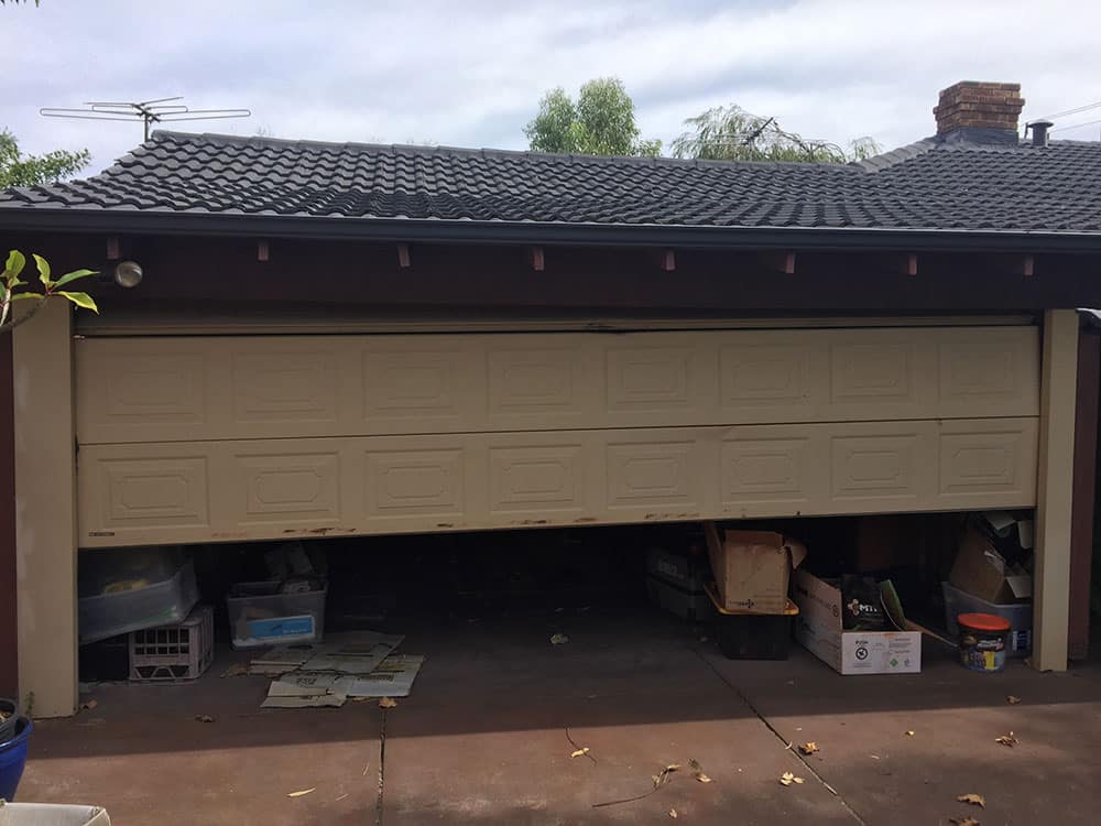 call a professional for a garage door springs replacement